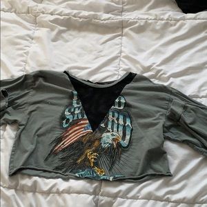 A dark grey, fishnet v top